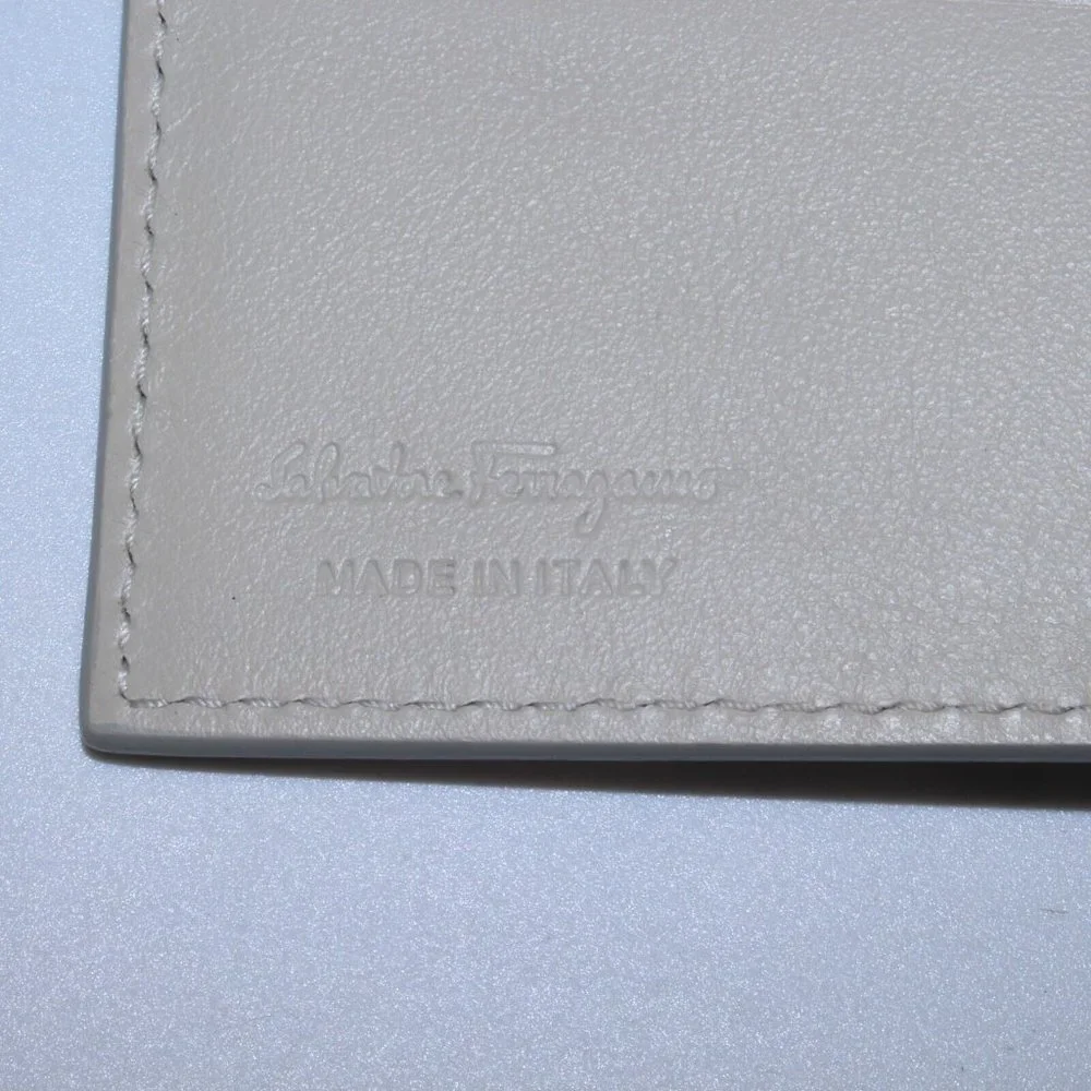 SALVATORE FERRAGAMO Embossed Beige Off White Leather Wallet NWOT